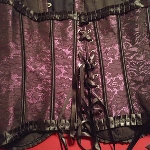 A black and dark purple 2x corset never worn